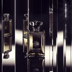 Amouage Reflection Man perfume bottle with a reflective surface