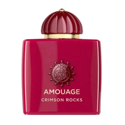 A red-colored bottle of Amouage Crimson Rocks Eau de Parfum with a decorative cap and branding on the front.