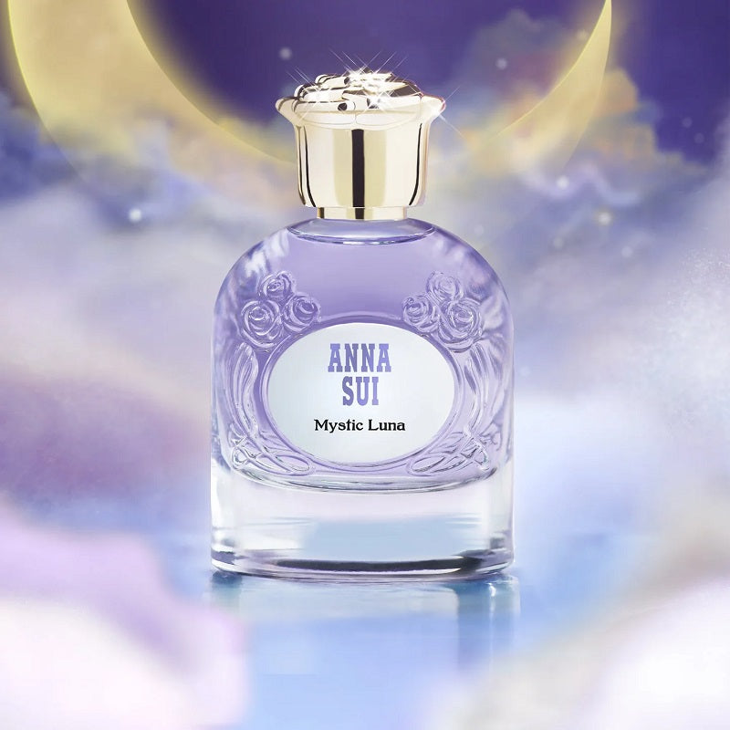 Anna Sui Mystic Luna perfume bottle with a celestial background