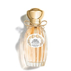 Gaultier Rose Pompon perfume bottle on a white background