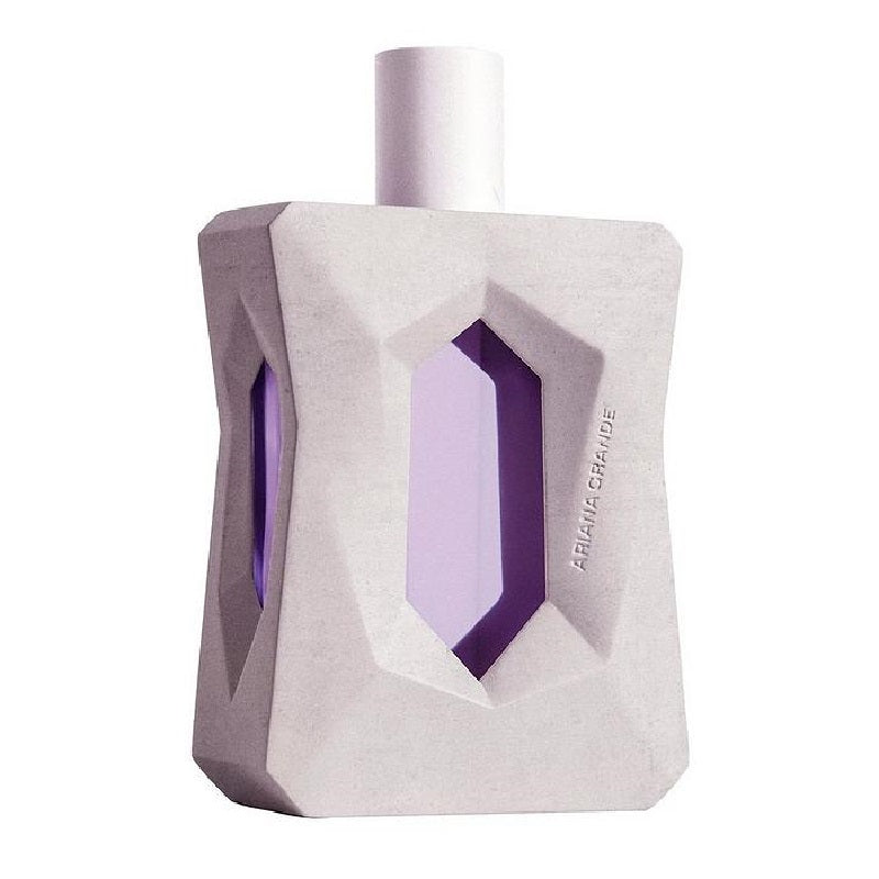 Perfume bottle with geometric design and purple interior on a white background