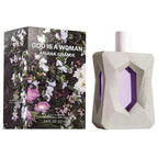 Ariana Grande 'God is a Woman' perfume bottle and packaging with floral design.