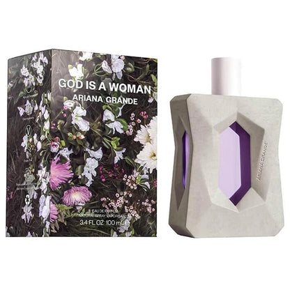 Ariana Grande 'God is a Woman' perfume bottle and packaging with floral design.