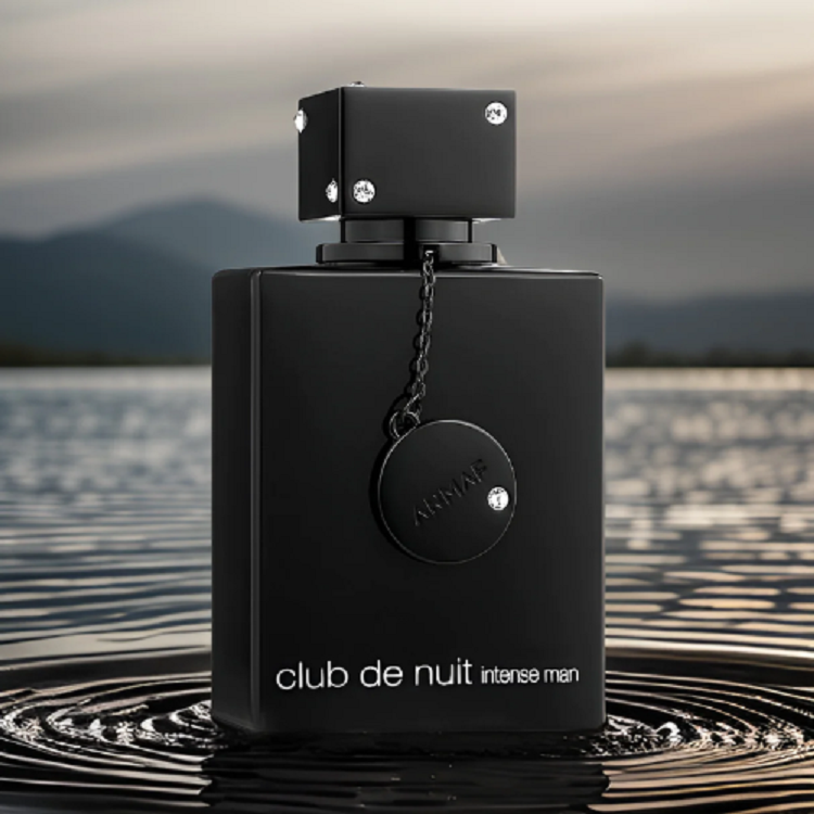 A black bottle of Club de Nuit Intense Man eau de toilette by Armaf with a metallic cap and chain detail, labeled with the product name.