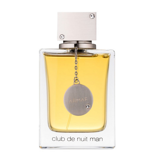 A transparent bottle of Club de Nuit Man Eau de Toilette by Armaf with a silver cap and label, containing yellow-colored liquid.