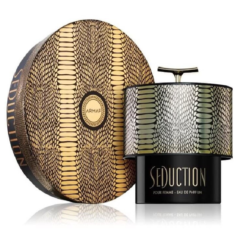Seduction perfume packaging with snake skin pattern on a white background