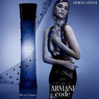 Giorgio Armani Armani Code perfume bottle with a model wearing a black dress against a blue background