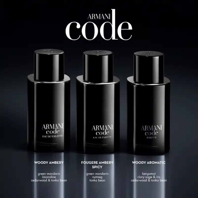 Three black Armani Code perfume bottles on a dark background