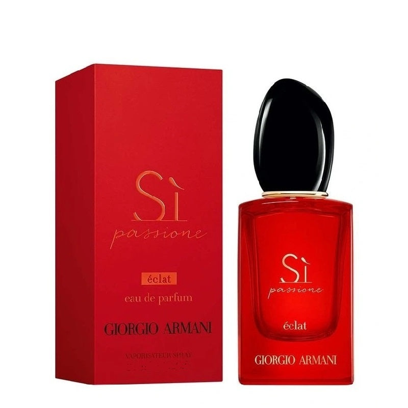 Red Giorgio Armani Si Passione Eclat perfume bottle and packaging on a white background