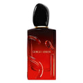 Red Giorgio Armani perfume bottle on a white background