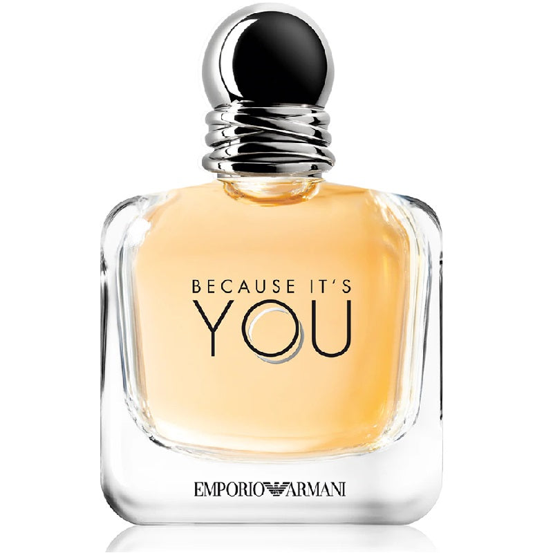 A bottle of 'Because It's You' Eau de Parfum by Emporio Armani with a clear, yellowish liquid visible through the transparent bottle, having a black cap and the text 'BECAUSE IT'S YOU' displayed prominently.