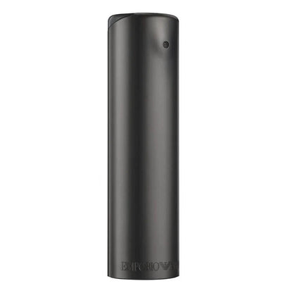 A black cylindrical bottle of Emprio Armani He Eau de Toilette by Armani with the brand name visible.