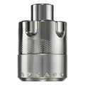 Silver Azzaro perfume bottle on a white background