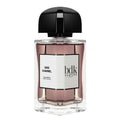A glass bottle of Gris Charnel 100ml Eau De Parfum by BDK Parfums with a black cap and a label that includes the product name and the brand.