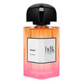 Perfume bottle with gradient design and black cap on a white background