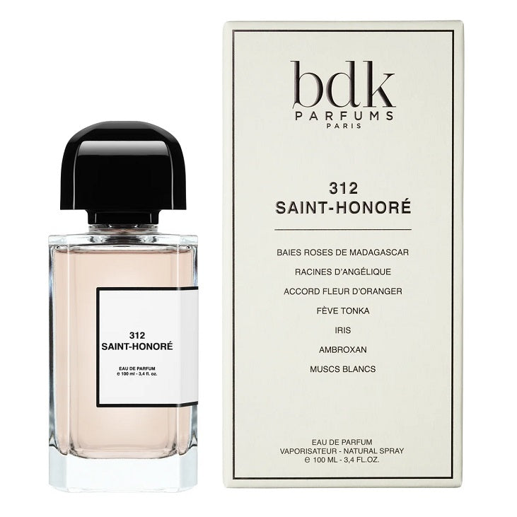 A bottle of BDK Parfums Paris 312 Saint-Honoré Eau de Parfum next to its cream-colored packaging box, set against a plain white background.