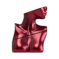 Eilish No. 3 by Billie Eilish perfume bottle in a reflective crimson finish, sculpted as a bust showing the shoulders, neck and lower face, against a white background.