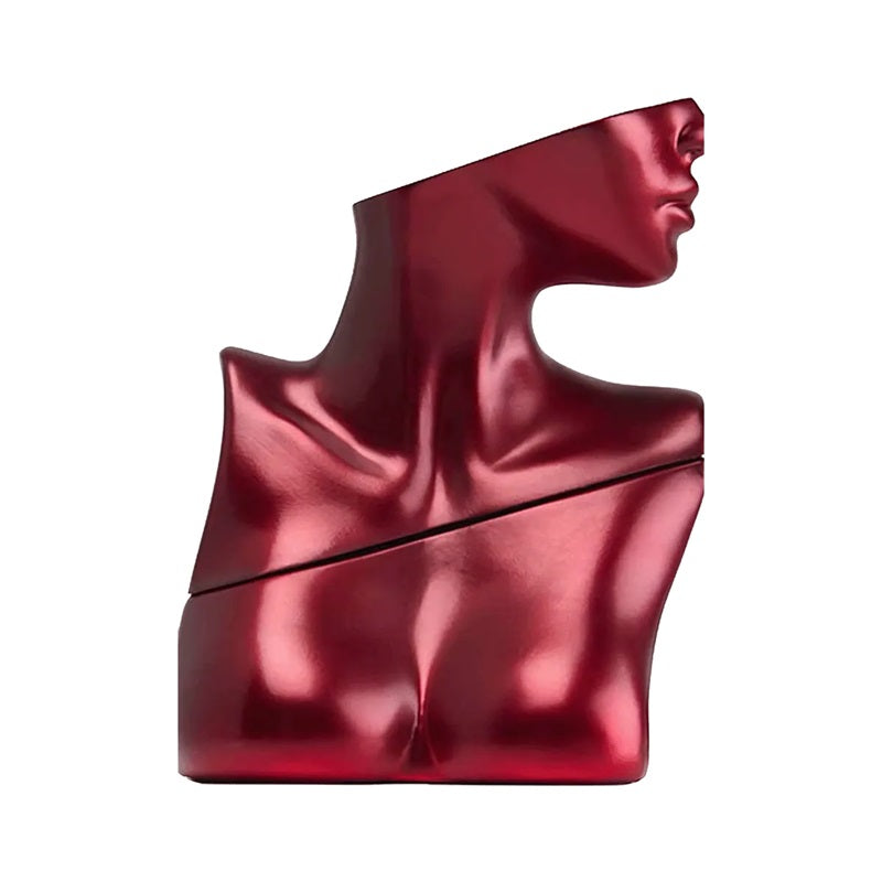 Eilish No. 3 by Billie Eilish perfume bottle in a reflective crimson finish, sculpted as a bust showing the shoulders, neck and lower face, against a white background.