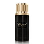 Chopard Black Incense Malaki perfume bottle with gold cap on a white background