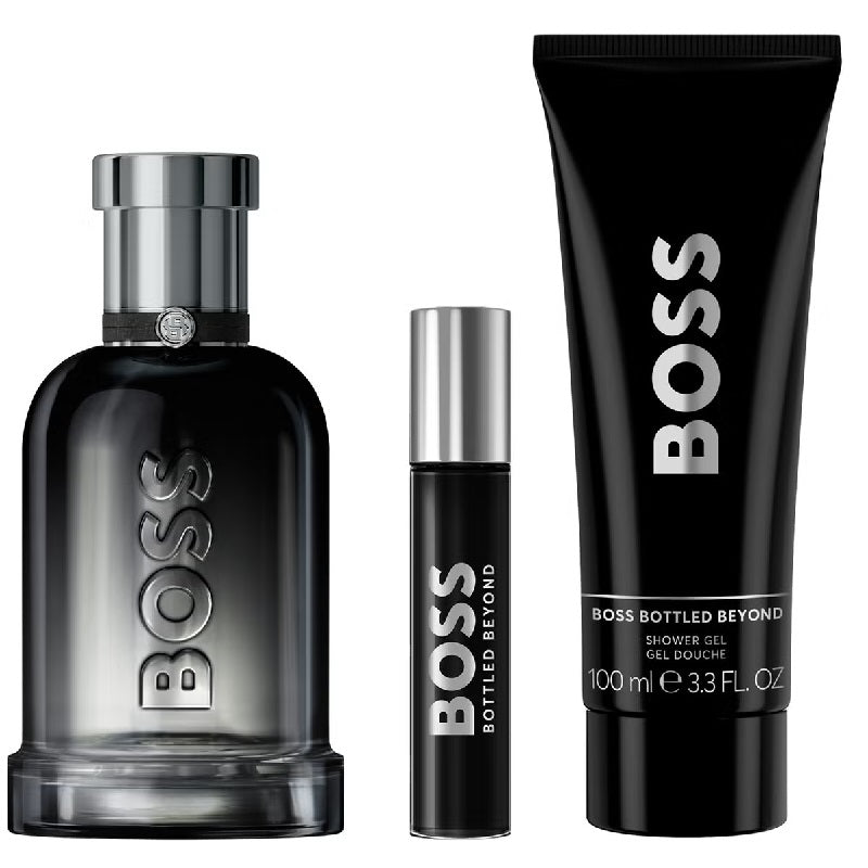 BOSS perfume set with a bottle, rollerball, and shower gel on a white background
