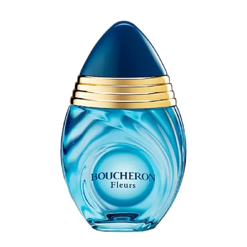 Blue Boucheron perfume bottle with gold cap on a white background
