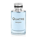 A glass bottle of Quatre Pour Homme Eau de Parfum by Boucheron with a blue liquid visible and the brand name printed on it.