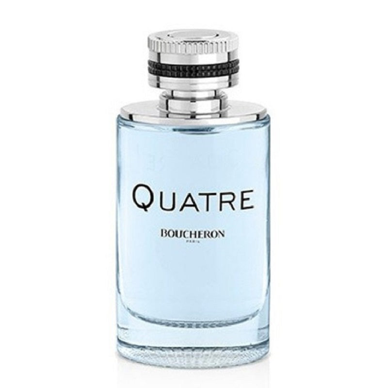 A glass bottle of Quatre Pour Homme Eau de Parfum by Boucheron with a blue liquid visible and the brand name printed on it.