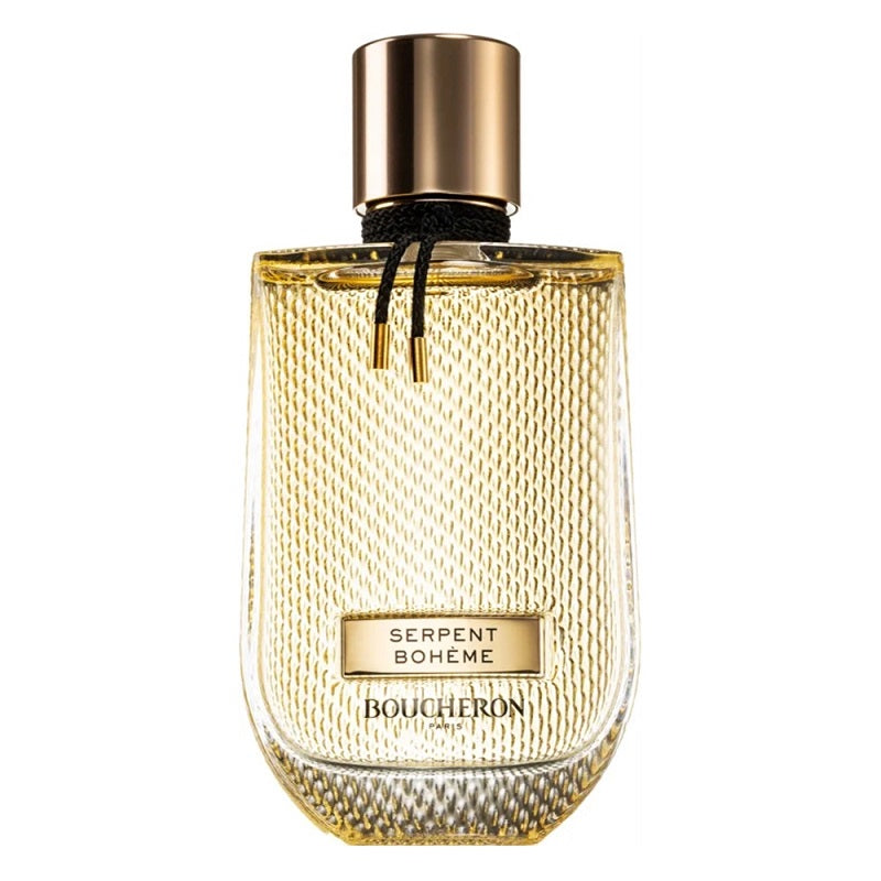 A glass bottle of Serpent Boheme Eau de Parfum by Boucheron with a gold-colored label and a metallic cap.