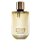 A glass bottle of Serpent Boheme Eau de Parfum by Boucheron with a gold-colored label and a metallic cap.