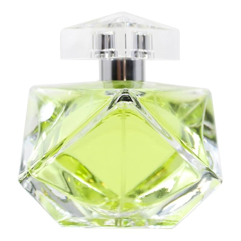 Clear glass perfume bottle with green liquid on a white background