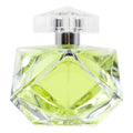 Clear glass perfume bottle with green liquid on a white background