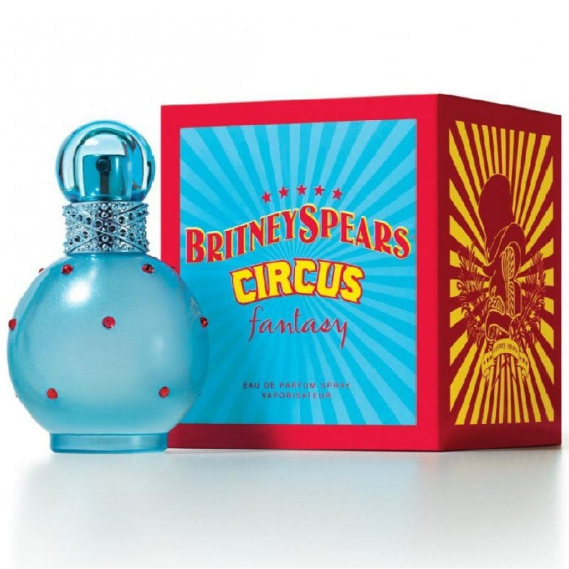 Blue perfume bottle with red polka dots and matching box featuring 'Britney Spears Circus Fantasy' on a white background.