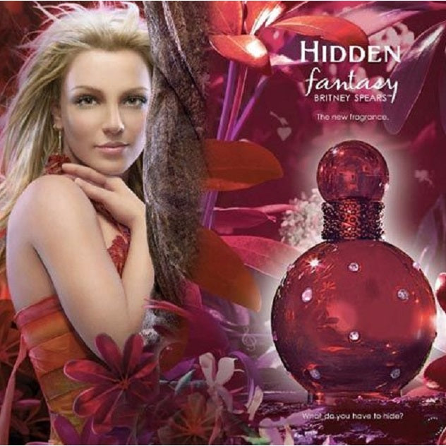 Advertisement for Britney Spears' 'Hidden Fantasy' perfume with a woman and the perfume bottle.