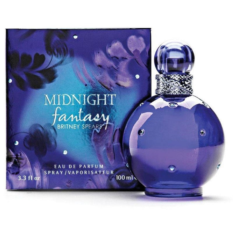 Blue perfume bottle and packaging with 'Midnight Fantasy' branding on a white background
