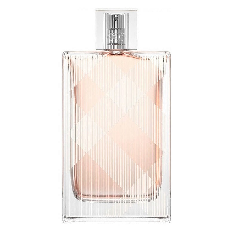 Clear perfume bottle with pink liquid on a white background