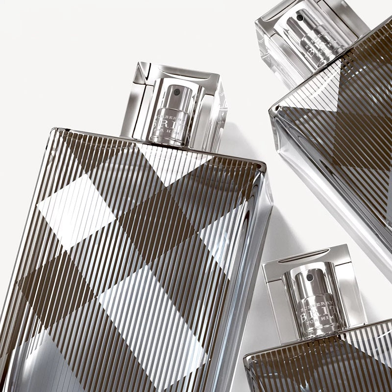 Close-up of perfume bottles with geometric design.