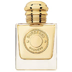A square-shaped bottle of Burberry Goddess eau de parfum with a golden cap and the brand's logo embossed on the front.