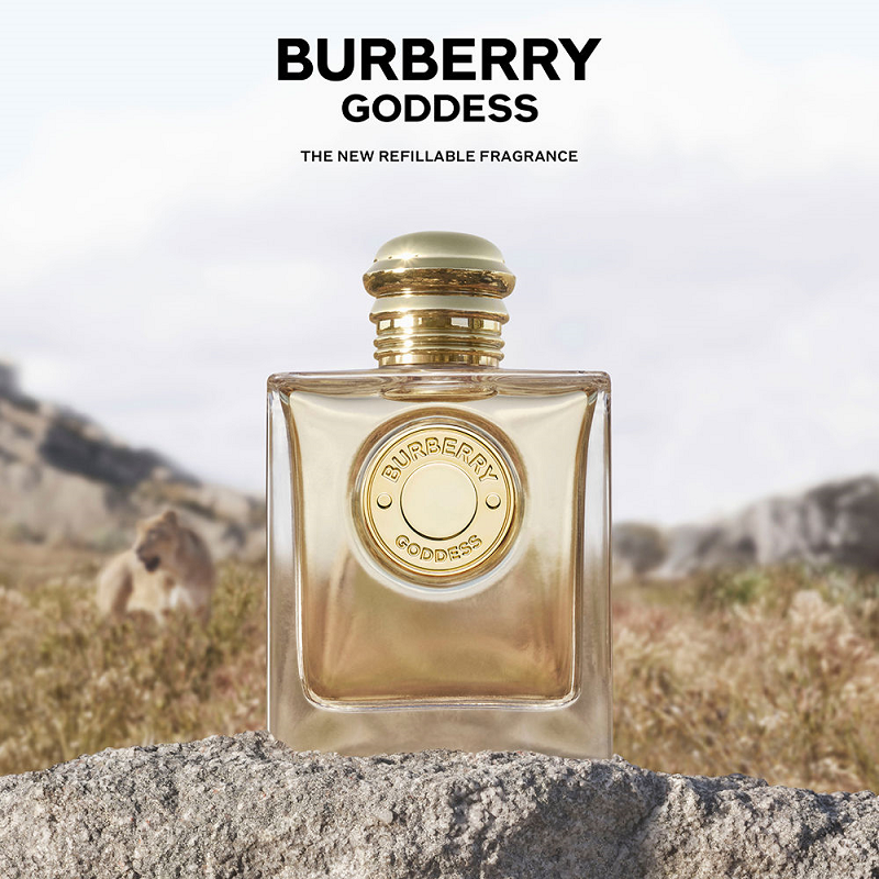 Burberry Goddess perfume bottle with a lion in the background