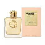 Burberry Goddess Eau de Parfum bottle and packaging, with the bottle prominently displaying the Burberry logo and a gold cap, and the packaging in a pale pink with the product name and brand.
