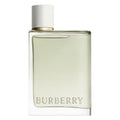 A bottle of Burberry Her Eau de Toilette with a white cap and clear, yellow-tinted liquid visible through the bottle, branded with the name 'Burberry' on the front.