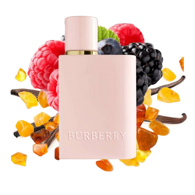 Perfume bottle with berries and vanilla beans