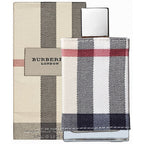 Burberry London Eau de Parfum bottle with striped beige and navy fabric in the background.