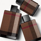 Three perfume bottles with plaid design on a white background