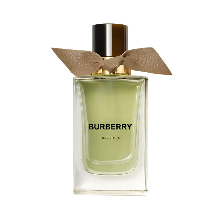 Bottle of Burberry Oud Storm eau de parfum with a clear green liquid visible and a beige bow on the cap.
