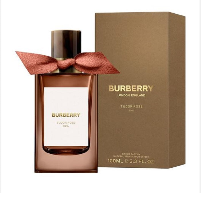 Burberry Tudor Rose perfume bottle and packaging with a pink ribbon.