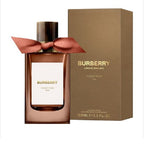 Burberry Tudor Rose perfume bottle and packaging with a pink ribbon.