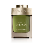 Bottle of Bvlgari Man Wood Essence eau de parfum with a green liquid visible and the brand and product name displayed on the label.