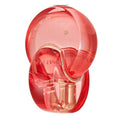 A red, transparent bottle of Omnia Coral Eau de Toilette by Bvlgari with a distinctive design, featuring the brand's initials 'BVLGARI' on the top.