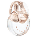 Bulgari perfume bottle with rose gold accents on a white background