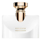 Perfume bottle with gold cap labeled 'Patchouli Tentation' on a white background